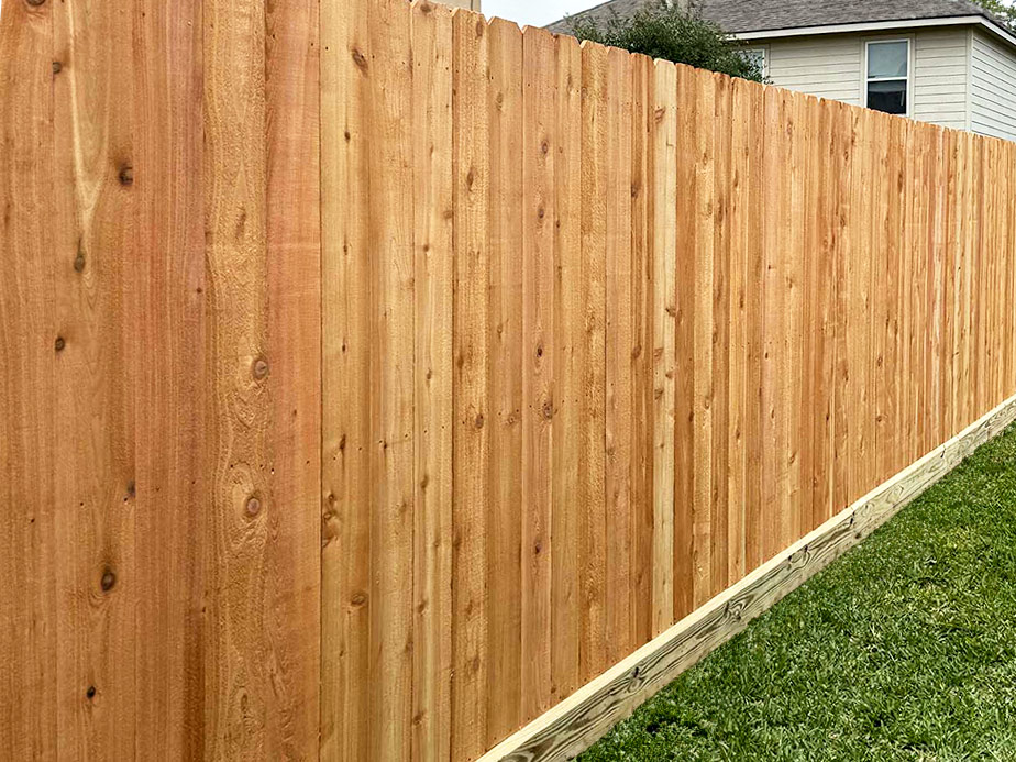 Fulshear TX stockade style wood fence